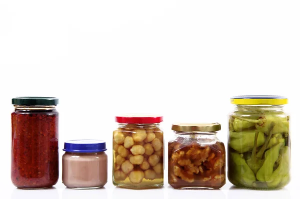 Collage aus Lebensmitteldosen auf weißem Hintergrund — Stockfoto