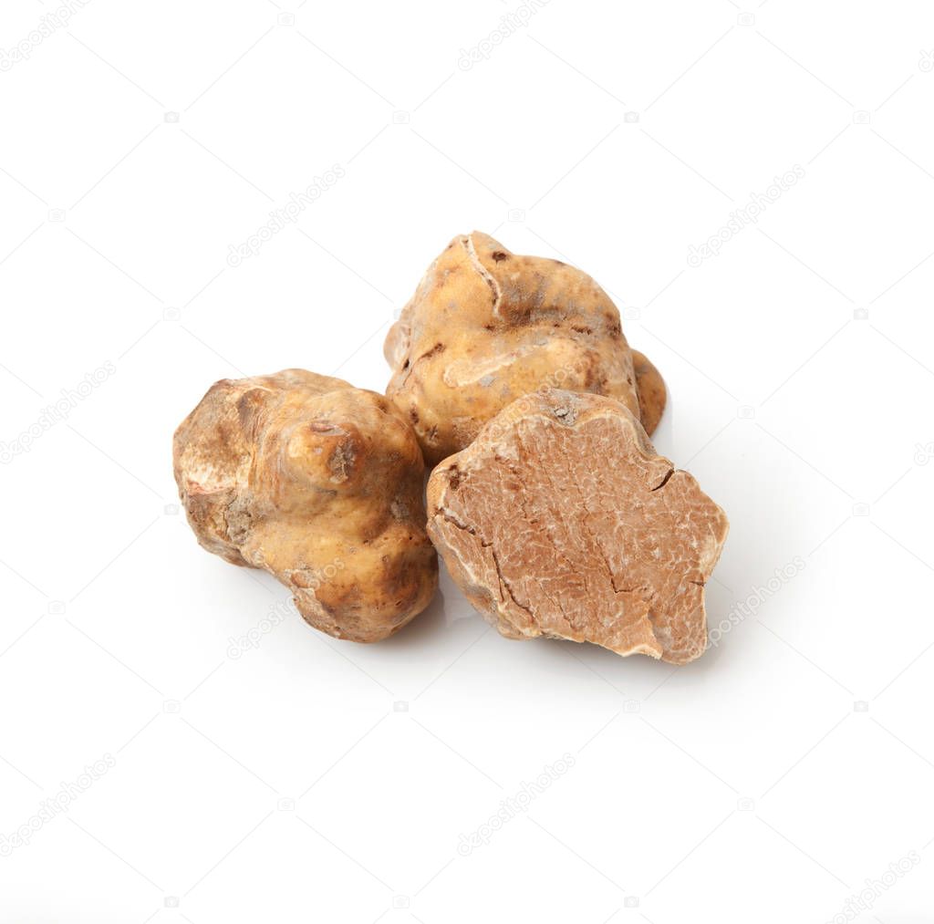 original italian white truffles in white background