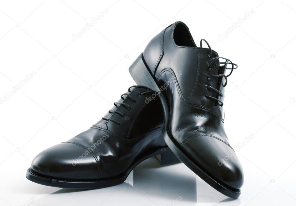 elegant male shoes in white background