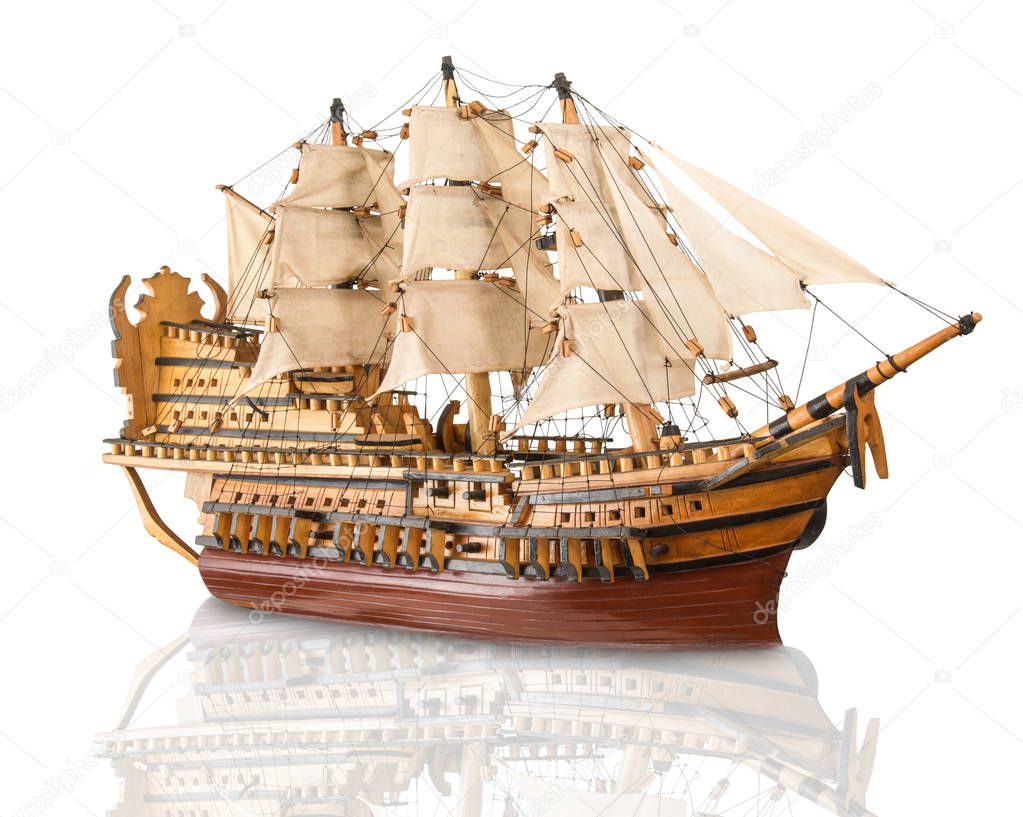 old model of galleon in white background