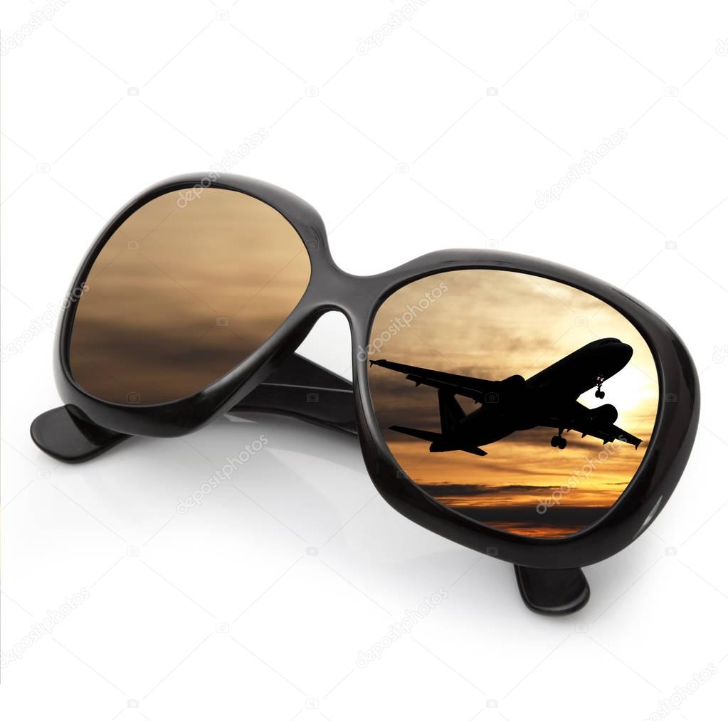 sunglasses with airplane in white background