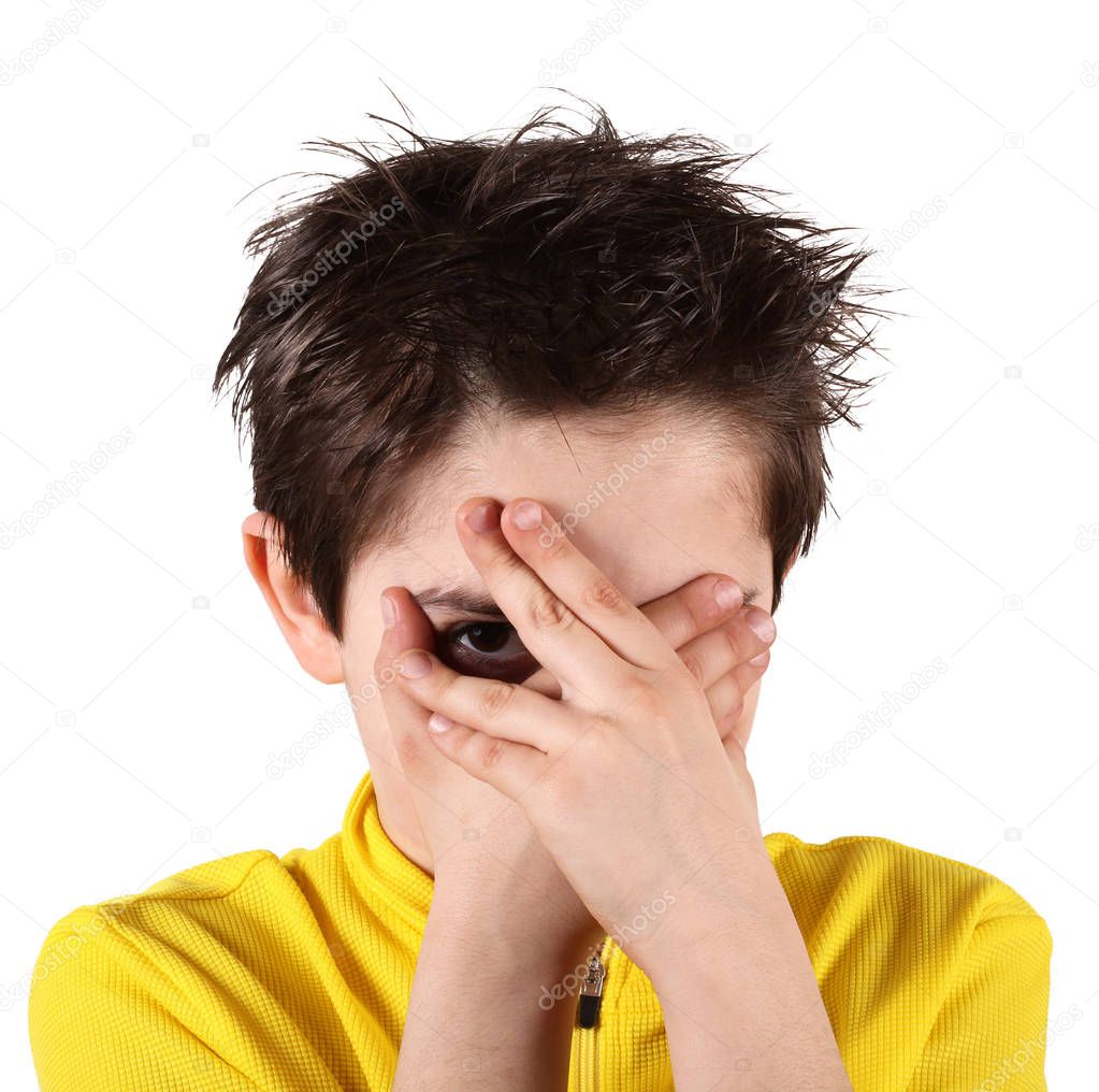 boy with frightened look in white background