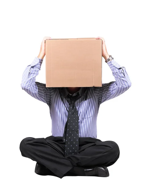 Obchodní muž s karton box na hlavu — Stock fotografie