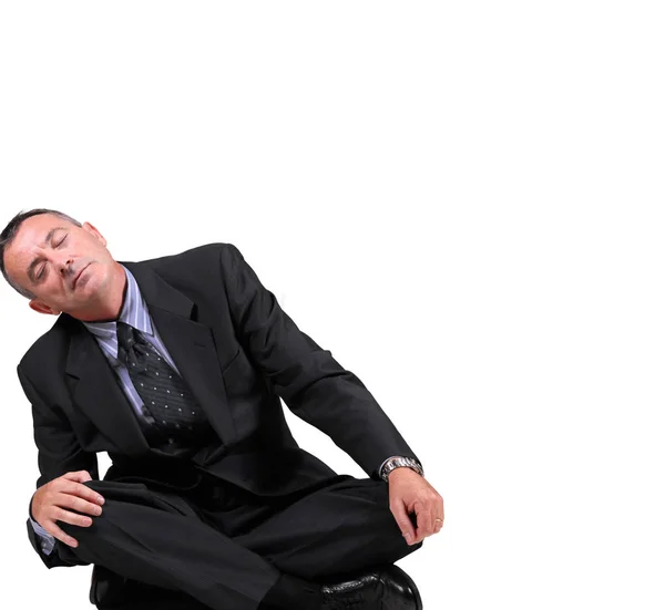 Beyaz arka planda uyumaya çalışıyor depresif iş adamı — Stok fotoğraf