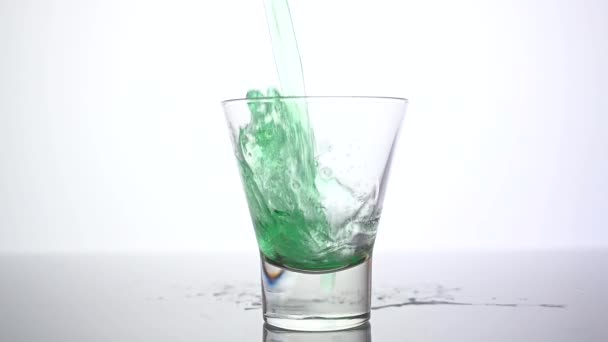 Glass Filled Green Cocktail — Stock Video