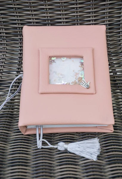 Handmade pink leather notebook with decoration like shaker with