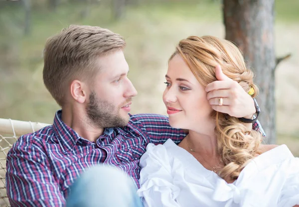 Portrait of young couple in love in the nature near seaside on s — Stock Photo, Image