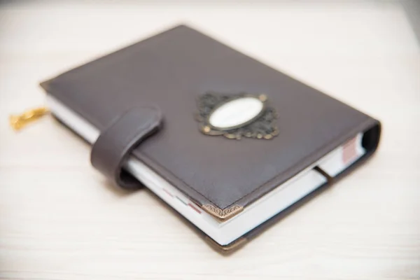 Handmade brown leather notebook, planner for business or educati