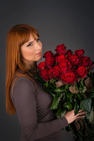 Young woman with ginger hair on international womens day with a