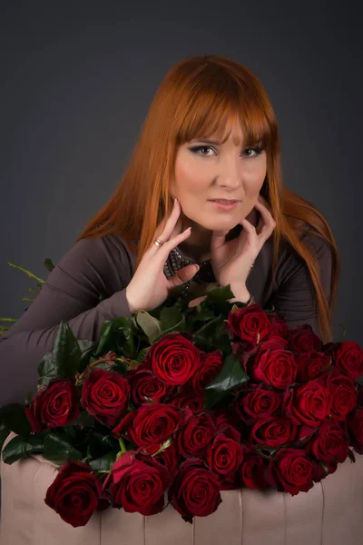 Young woman with ginger hair on international womens day with a