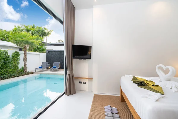 spacious bedroom pool access in luxury home