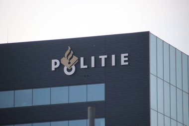 Hollanda 'daki Veilingweg' de Rotterdam Crooswijk 'te bir ofisin polis logosu.