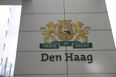 Barış ve Adalet anlamına gelen Vrede en Recht metniyle Den Haag belediyesinin (Lahey) gözaltı ve logosu