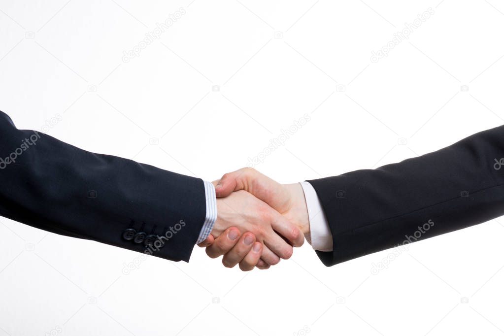 Business handshake isolated on white background from the side