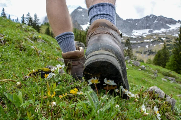 Hiking in the mountains with hiking boots