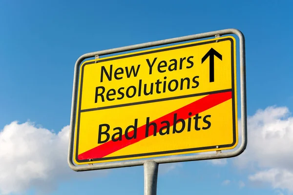 Yellow street sign with New Years resolutions ahead leaving bad — Stock Photo, Image
