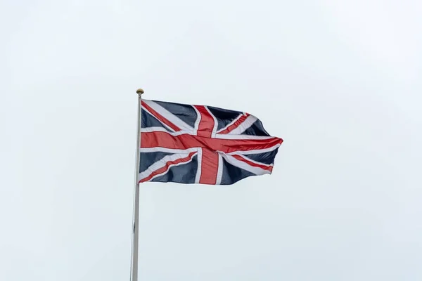 La bandera del Reino Unido en un poste — Foto de Stock