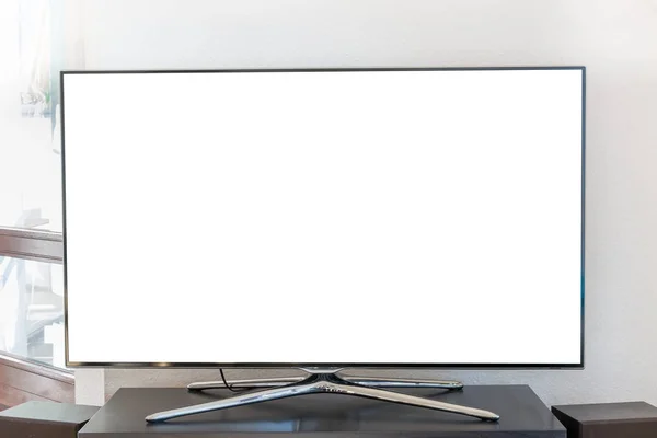 Prázdná bílá obrazovka Tv na dřevěnou lavici v obývacím pokoji — Stock fotografie