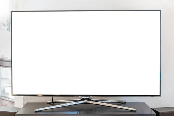 Leere weiße TV-Leinwand auf einem Holzständer im Wohnzimmer — Stockfoto