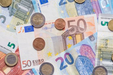 Euro banka banknot ve madeni paraların arka plan olarak kapat