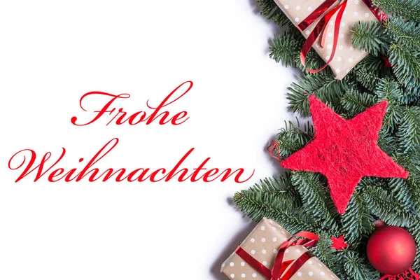 Frohe Weihnachten in rot auf weihnachtlichem Hintergrund — Stockfoto