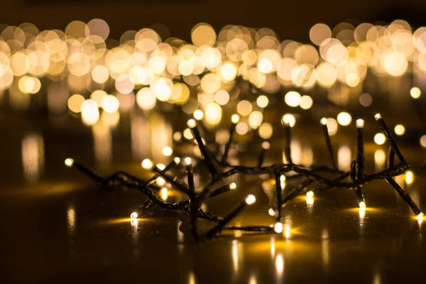 Fairy lights for the Christmas tree with blurry background