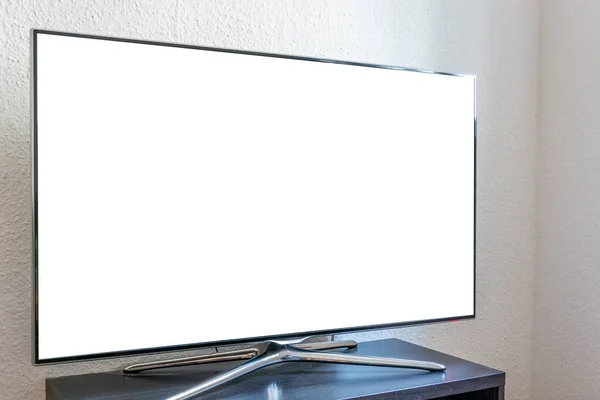 リビングルームでテレビの空白の白い広告スペース — ストック写真