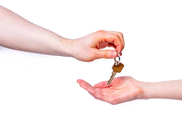 Beyaz Bir Arkaplanda Izole Edilmiş Evin Anahtarları Kişinin Elinde — Stok fotoğraf