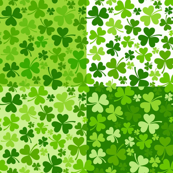 Conjunto de dia de St. Patrick vetor sem costura fundos com shamrock . —  Vetores de Stock