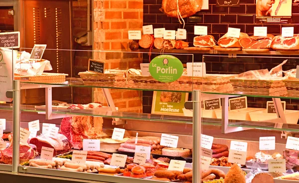 Rouen, Frankrijk - november 26 2016: een kraam van de slager varkensvlees — Stockfoto