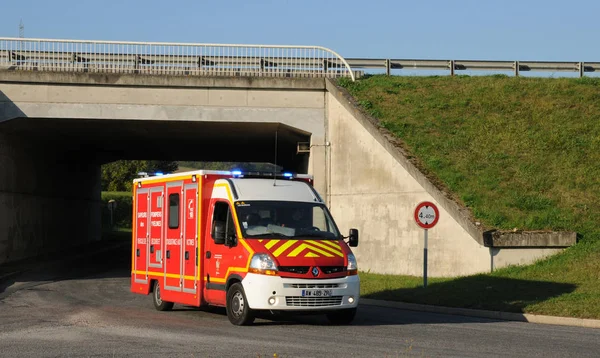 Les Mureaux; France - october 7 2017 : firefighter truck on a ro — Zdjęcie stockowe