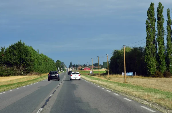 Les Thilliers en Vexin, France - August 8 2019: the D 6014 road — стокове фото