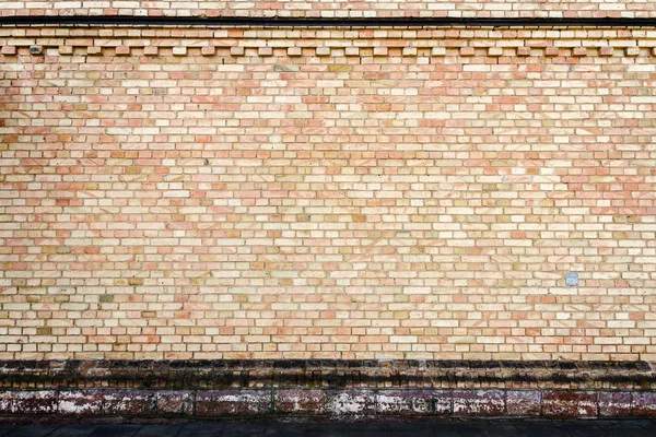 Amarelo parede de tijolo fundo — Fotografia de Stock