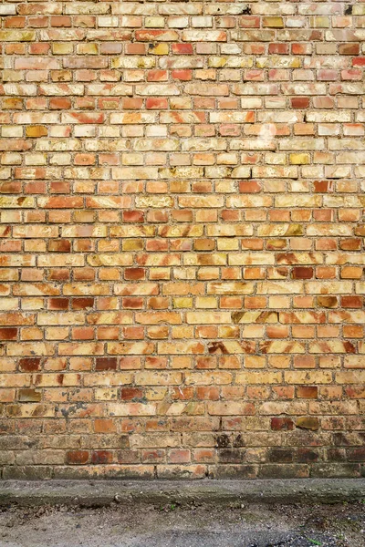 Amarelo parede de tijolo fundo — Fotografia de Stock