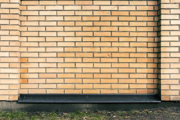 Levendige gele baksteen hek — Stockfoto