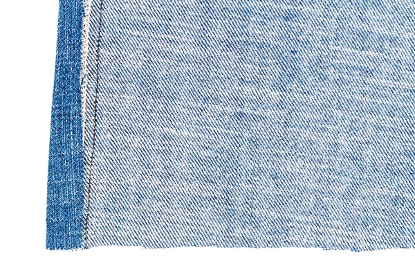 Stuk van blue jeans stof — Stockfoto