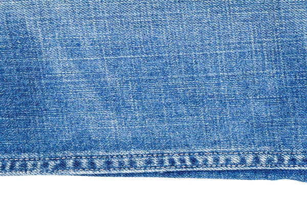 Pedaço de tecido de jeans azul claro — Fotografia de Stock