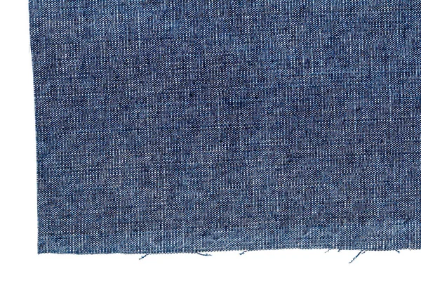 Stuk van donkerblauwe jeans stof — Stockfoto