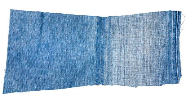 Pedaço de tecido de jeans azul claro — Fotografia de Stock