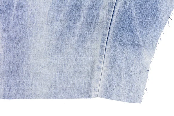 Pedaço de tecido de jeans azul claro — Fotografia de Stock