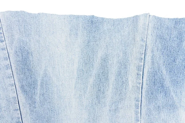 Pedaço de tecido de jeans azul claro — Fotografia de Stock