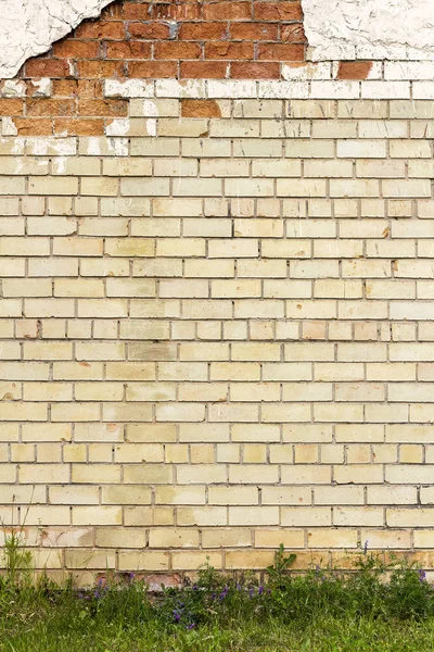 Kırmızı ve sarı tuğla duvar arkaplanı — Stok fotoğraf