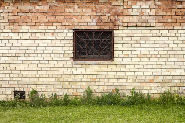 Gele bakstenen muur — Stockfoto