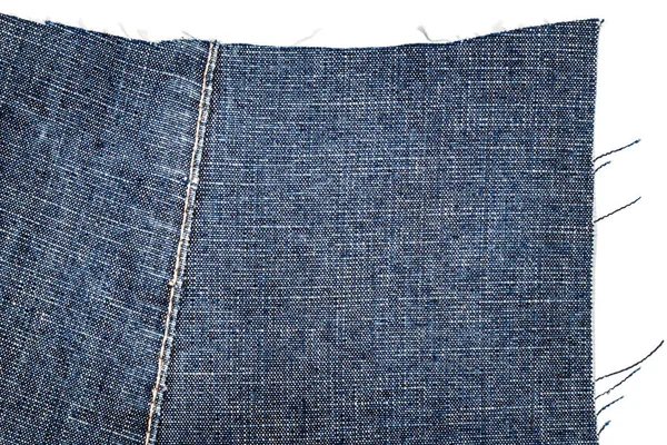 Stuk van donkerblauwe jeans stof — Stockfoto