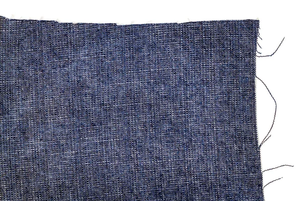 Piece of dark blue jeans fabric — Stock Photo, Image