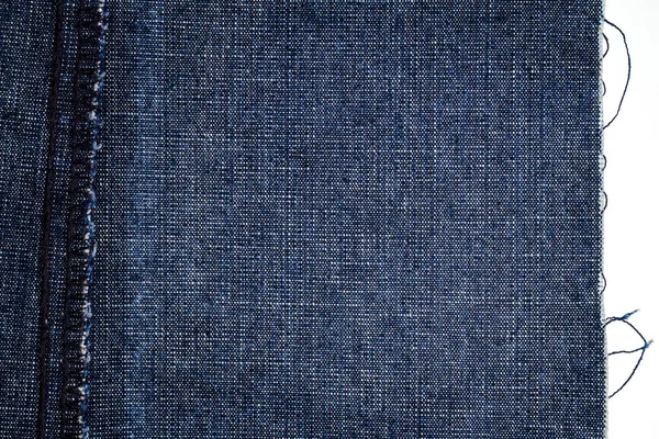 Piece of blue jeans fabric — Stock Photo, Image