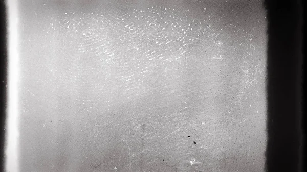 Moldura de filme barulhento com arranhões pesados, poeira e grãos — Fotografia de Stock