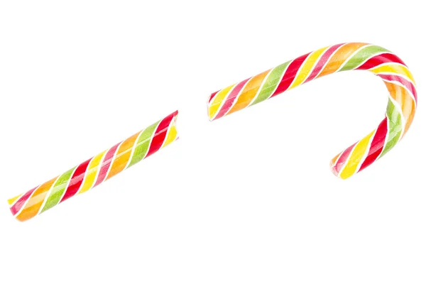 Sabroso roto colorido a rayas bastón de caramelo —  Fotos de Stock