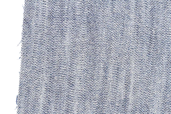 Piece of blue jeans fabric