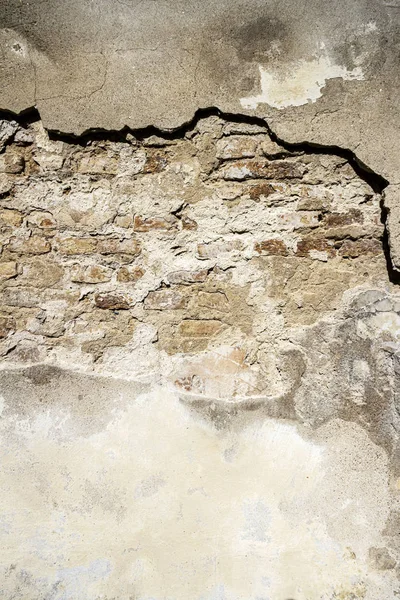 Старый бежевый кирпич и гипсовая стена фон текстуры — стоковое фото